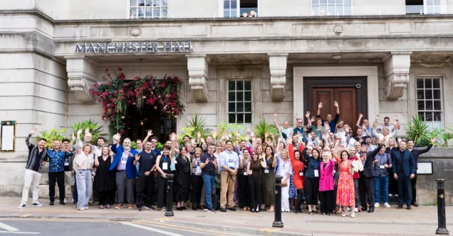 Picture of the delegates from EI2025 outside Manchester Hall